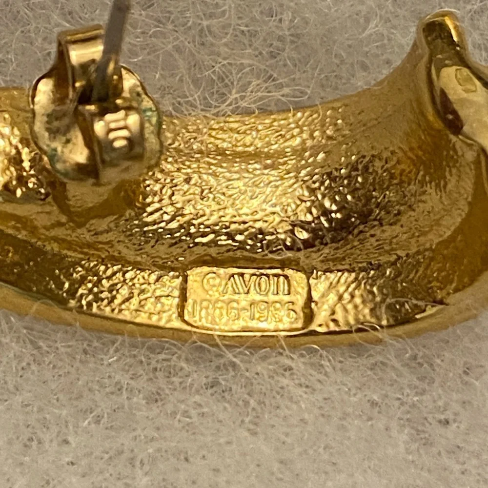Vintage AVON 100th Anniversary (1886 -1986 Gold Tone curved stud earrings